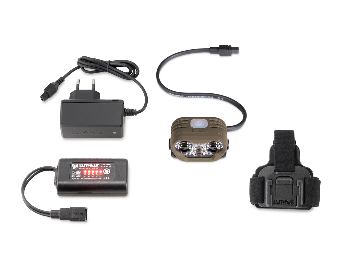 Scope of delivery without Bluetooth: Blika light head in Dark Earth, 3.5 Ah SmartCore battery, headband with mount and Wiesel charger