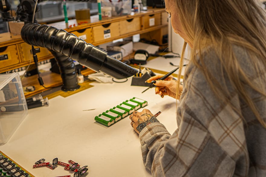 production at Lupine – employee mounted electronics by hand
