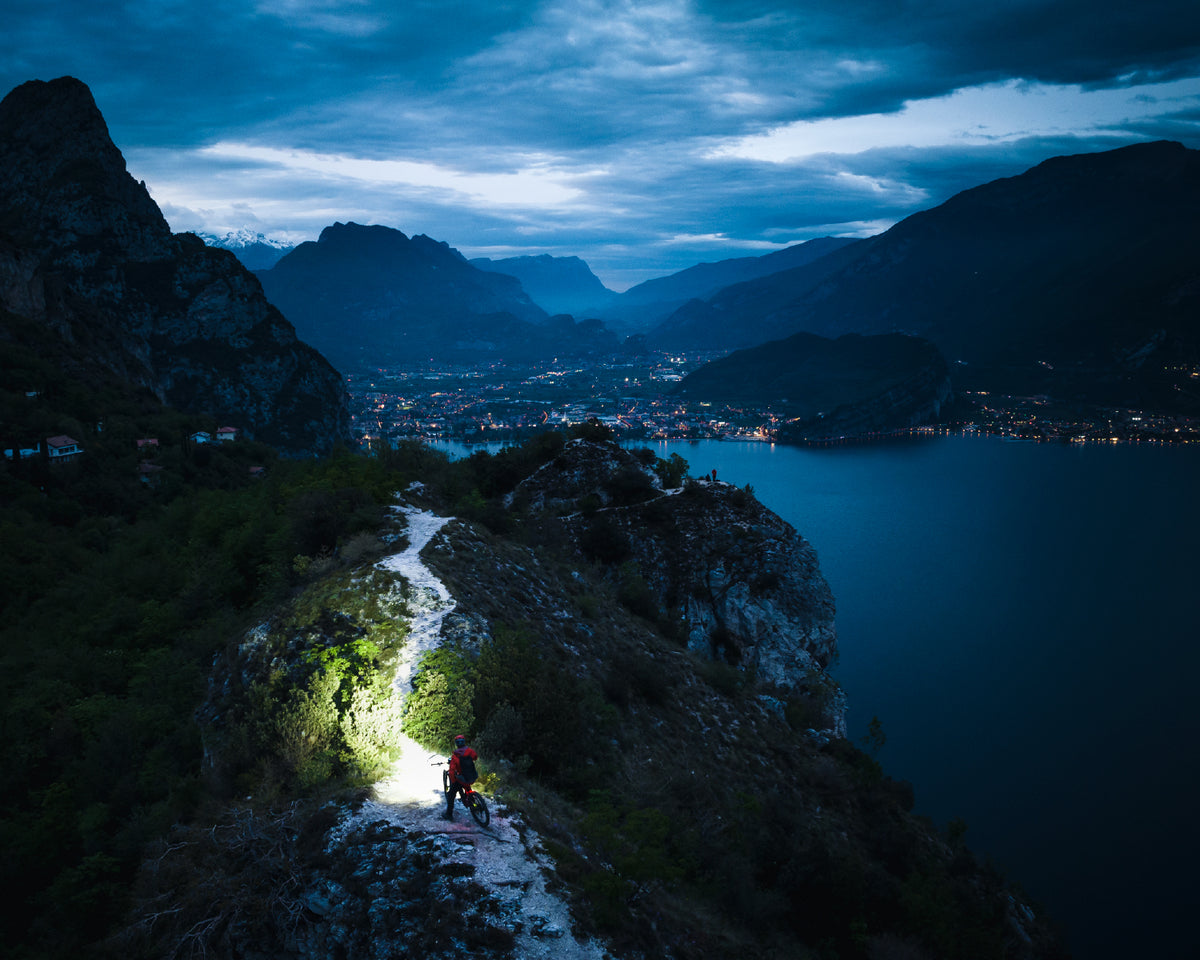 nocturnal view on a illuminated valley with lake
